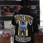 Person wearing a 'Death Row Records' jacket in a record store.